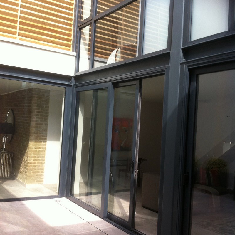 Anthracite aluminium sliding patio doors fitted in Borehamwood