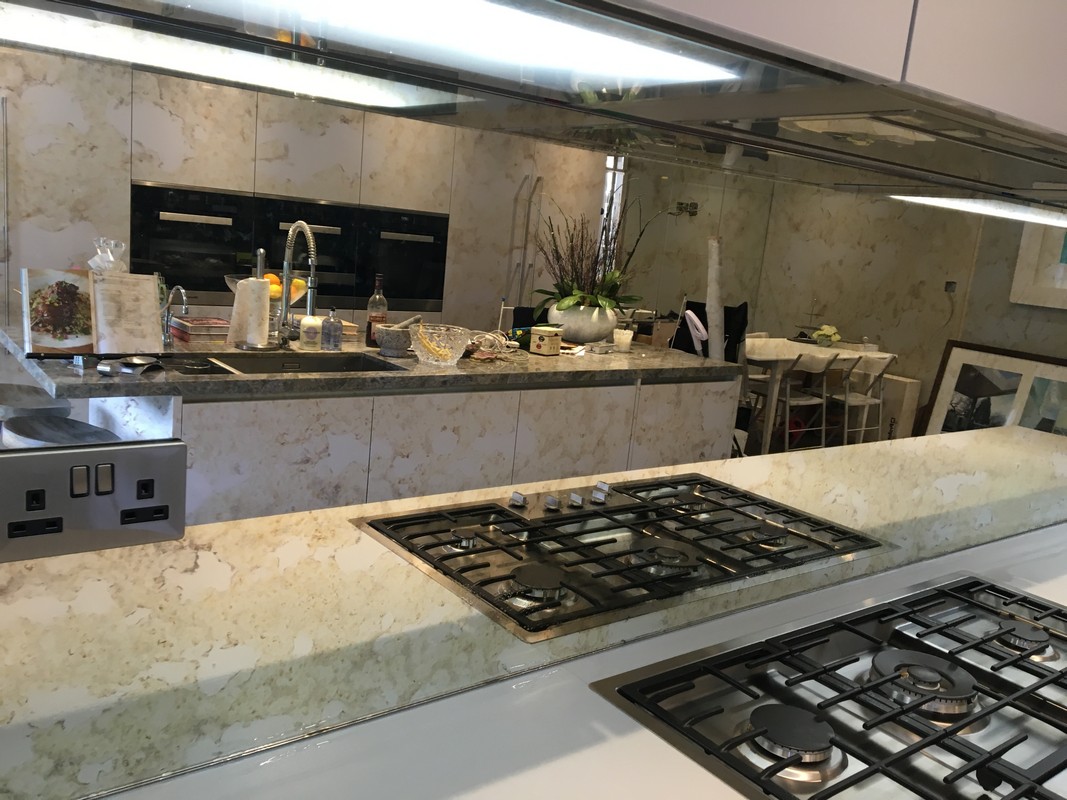 Mirror glass splashback in Borehamwood luxury kitchen